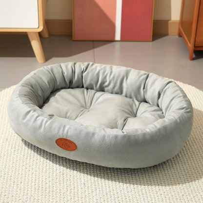 Oval Plush Pet Bed with Waterproof Base