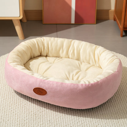 Oval Plush Pet Bed with Waterproof Base