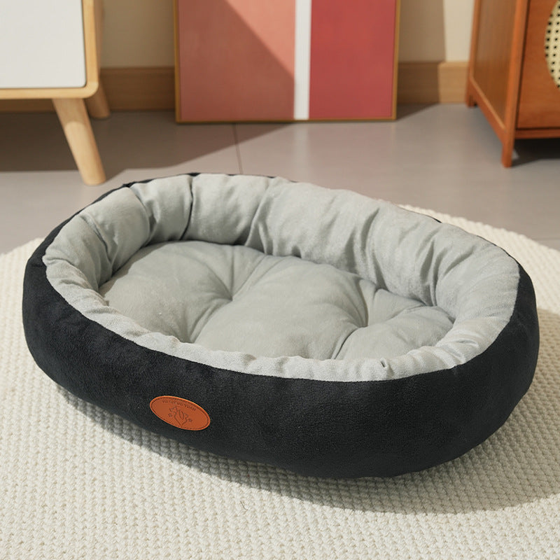 Oval Plush Pet Bed with Waterproof Base