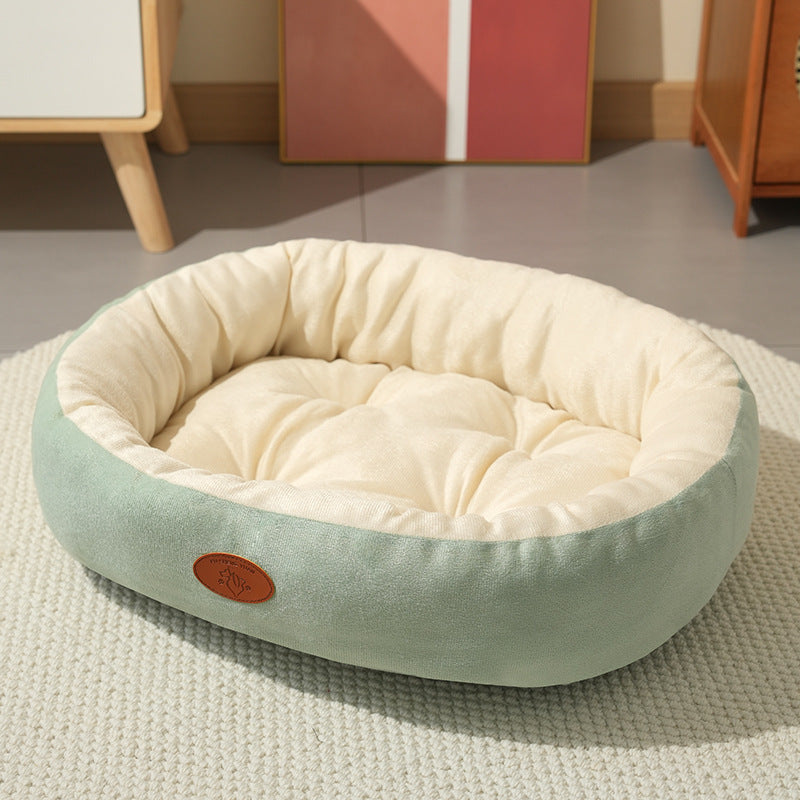 Oval Plush Pet Bed with Waterproof Base