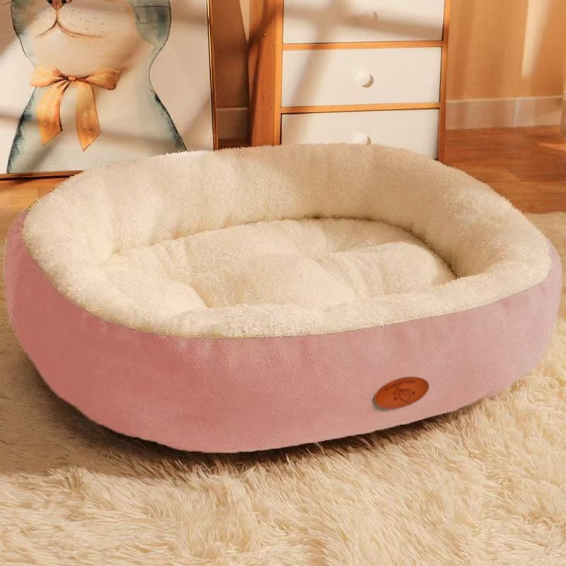Oval Plush Pet Bed with Waterproof Base