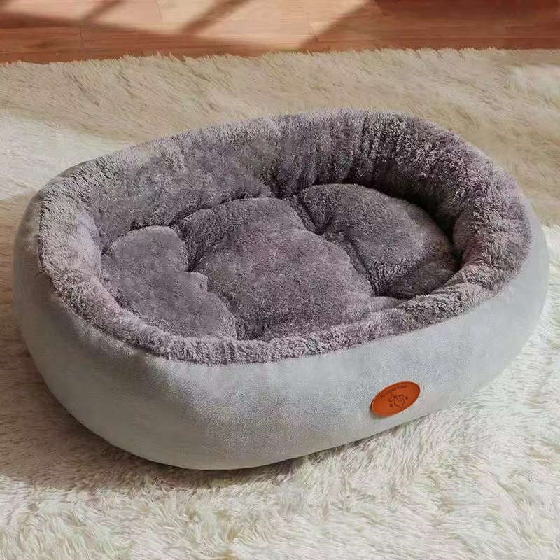 Oval Plush Pet Bed with Waterproof Base