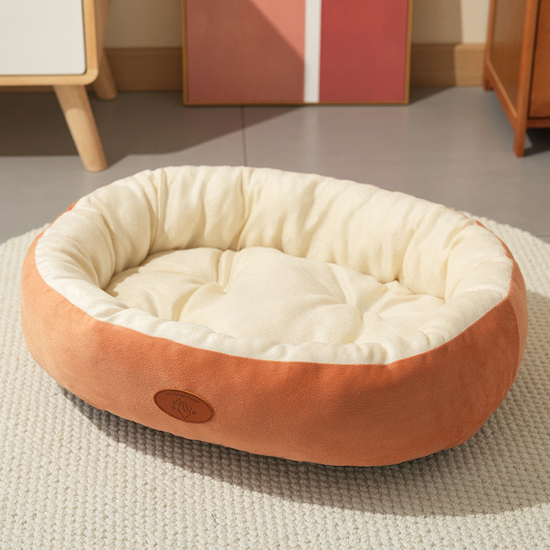 Oval Plush Pet Bed with Waterproof Base